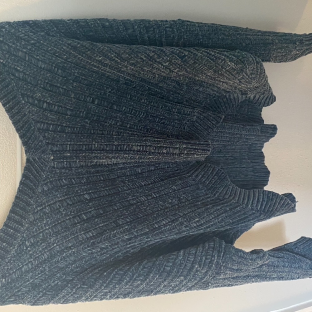 A blue sweater